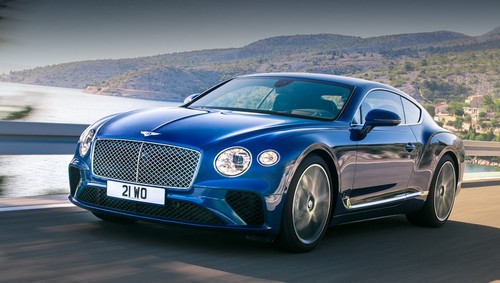 Bentley continental gt. Англичане уверяют, что, несмотря на тесное сотрудничество с Porsche, 82% деталей у их купе уникальны. Фары ― светодиодные матричные.
